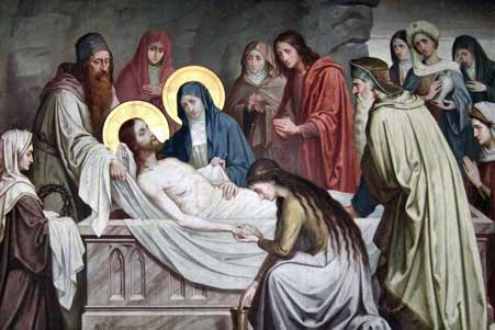 14e statie Jezus wordt in het graf gelegd